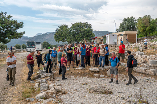 Xanthos, Turkey-May 22, 2022 people are visiting Xanthos, which was the capital of ancient Lycia, illustrates the blending of Lycian traditions especially in its funerary art.