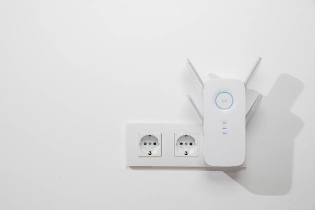Wifi Extender in Power Outlet stock photo