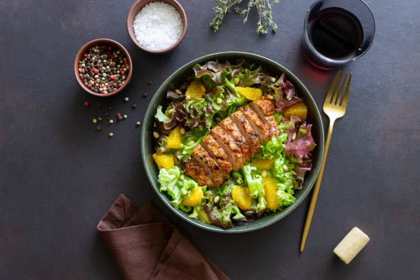 istock Salad with duck, oranges and nuts. Healthy eating. Diet. 1400571158