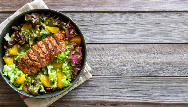 istock Salad with duck, oranges and nuts. Healthy eating. Diet. 1400571243