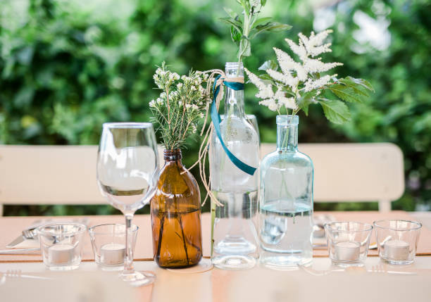 istock Table decoration with flowers in weddig party 1400575904