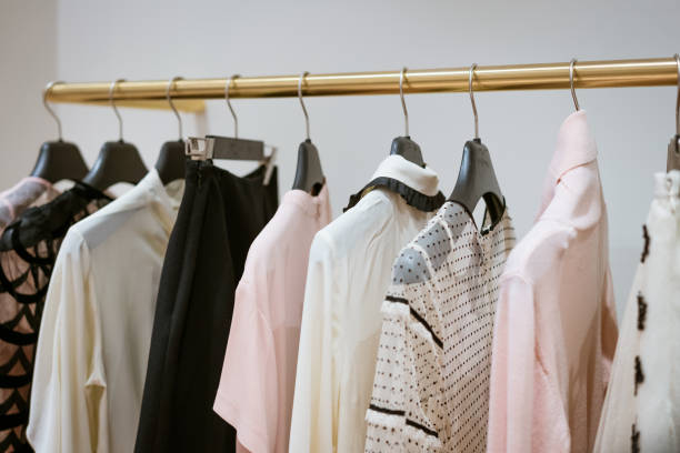 istock Women's clothing hanging in the store 1400576140