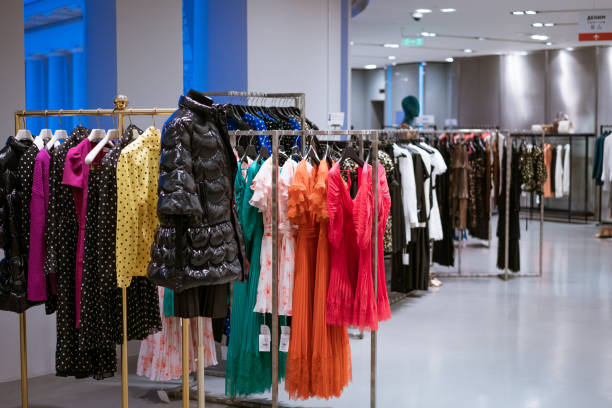 istock Women's clothing hanging in the store 1400576144