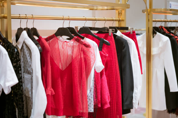 istock Women's clothing hanging in the store 1400576152