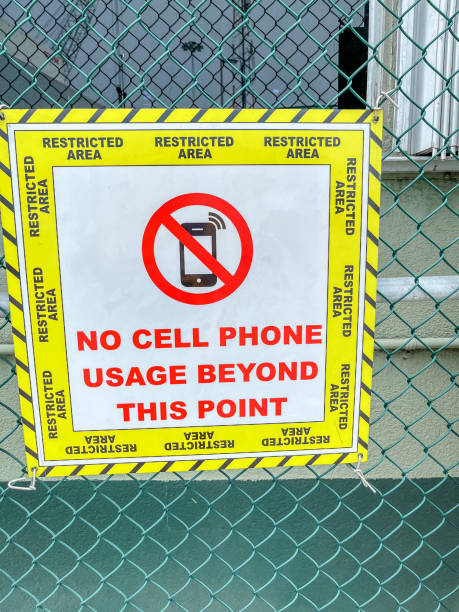 istock No cellphones sign on wire mesh fence 1400576300