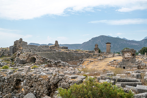 Xanthos, which was the capital of ancient Lycia, illustrates the blending of Lycian traditions especially in its funerary art. The rock-cut tombs, pillar tombs and pillar-mounted sarcophagi are unique