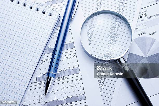 Business Data Analyzing Stock Photo - Download Image Now - Financial Report, Magnifying Glass, Scrutiny