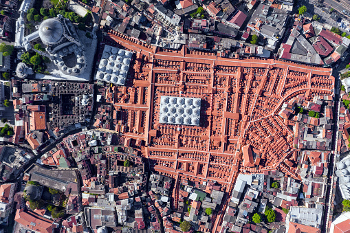 Aerial view of Grand Bazaar in Istanbul, Turkey. It is one of the largest and oldest covered markets in the world, with 61 covered streets and over 4,000 shops on a total area of 30,700 m², attracting between 250,000 and 400,000 visitors daily