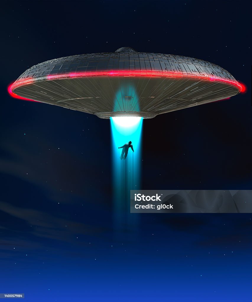 Abduction A UFO that is abducting a human Alien Stock Photo