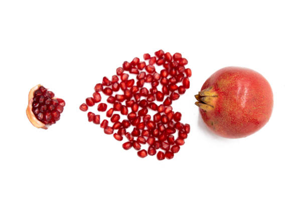 istock Pomegranate isolated on white background. also known as bedana 1400580953