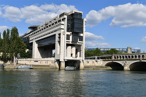 Paris, France-05 06 2022: The modern Building of the Ministry of Finance and Economy  located in The Bercy district on the banks of the Seine river in Paris, France.