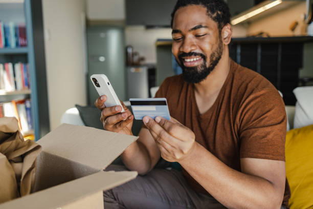 istock Man satisfied with his online purchase decided to repeat a purchase 1400583046