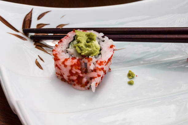 sushi caviar roll and sticks on the plate
