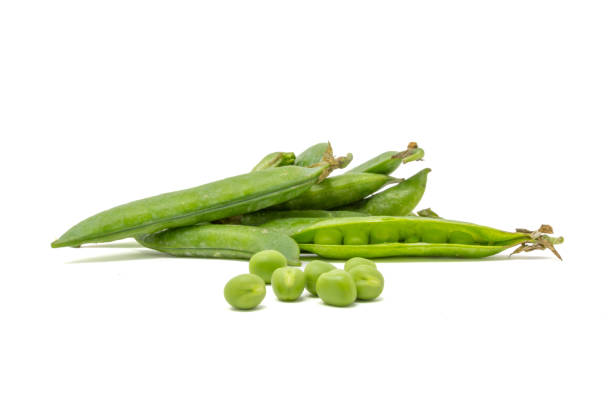 istock Fresh peas, pods and shelled, on a white background 1400598330