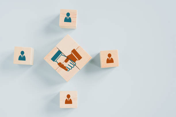 istock wooden cube block with hand shake icon in middle for teamwork, brainstorming, cooperation for business growing concept 1400598531