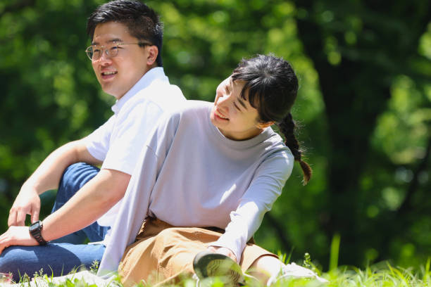 istock Enjoying picnic at park 1400601795