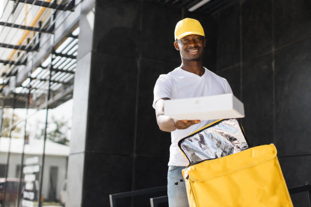 African American man courier from express delivery, shopping online concept