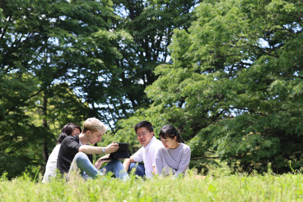istock Enjoying picnic at park 1400602490