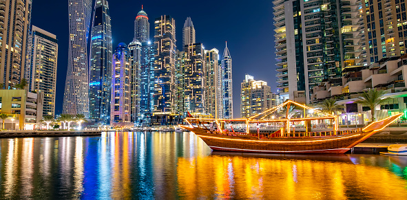 Scenic view of night Marina Bay skyline in Dubai, United Arab Emirates