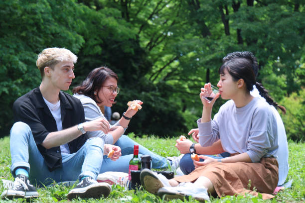istock Enjoying talk in picnic at park 1400604198