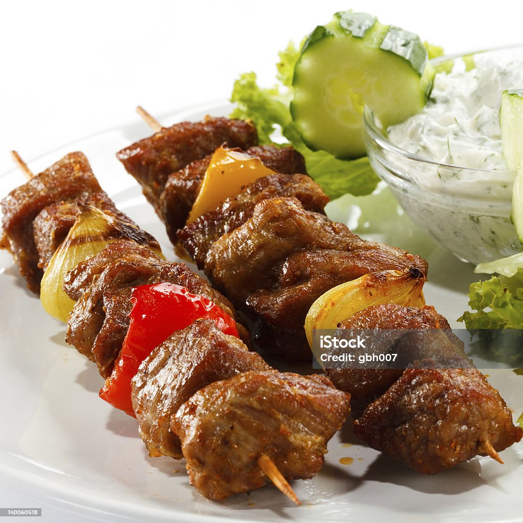 Kebab - grilled meat and vegetables Grilled meat and vegetables  Appetizer Stock Photo