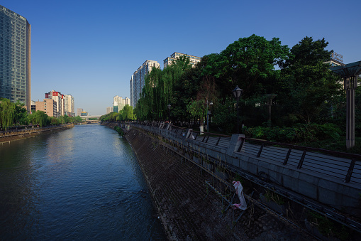 Chengdu riverside modern office building at dusk
