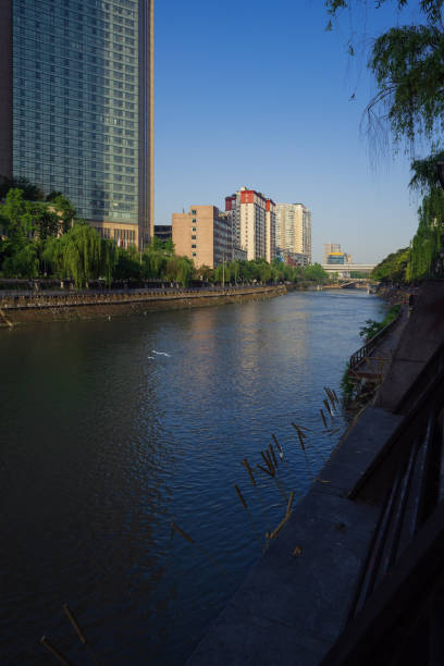 istock Chengdu riverside modern office building at dusk 1400605601