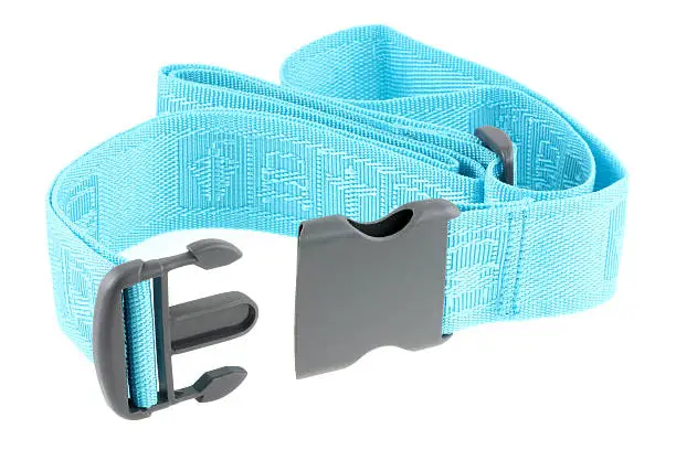 A new adjustable blue Travel Luggage Belt (Strap) with polypropylene buckle isolated on white