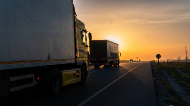 Vehicles exporting at sunrise stock photo