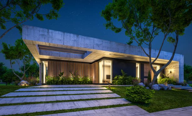 istock 3d rendering of new concrete house in modern style in night 1400607807
