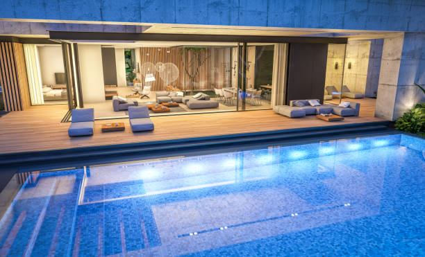 istock 3d rendering of new concrete house in modern style in night 1400607924