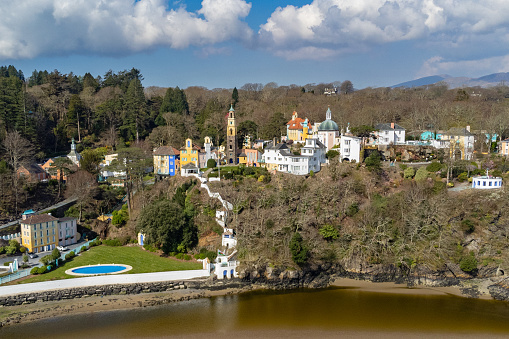 Wide angle aerial view of colourful buildings at Portmeirion village. Portmeirion is a village in Gwynedd, North Wales.