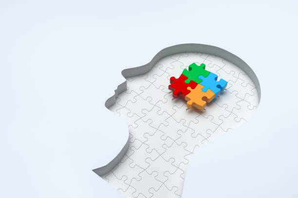 istock Colorful puzzle pieces in the human brain 1400622095