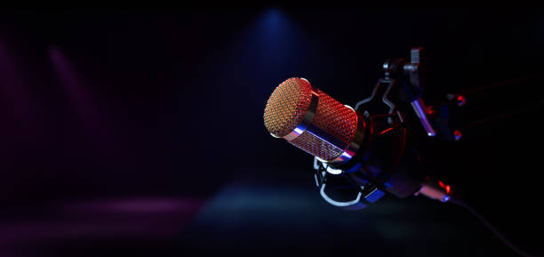 istock microphone on stage in neon lights. live performance, karaoke and music concert background. copy space 1400623372