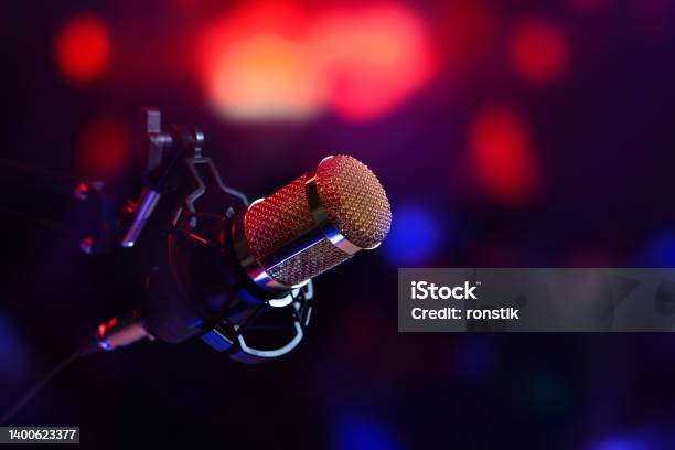 Studio Microphone In Neon Lights Sound Recording Equipment Stock Photo - Download Image Now