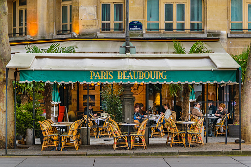 PARIS, FRANCE, JANUARY - 2020 - Coffe restaurant exterior facade, at Paris city, France