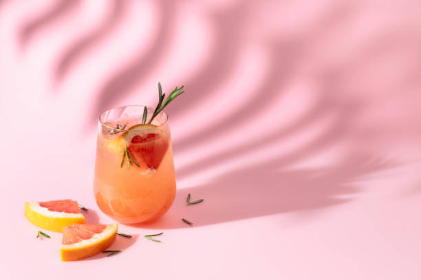 istock Summer cocktail with grapefruit, rosemary, and ice. 1400634775