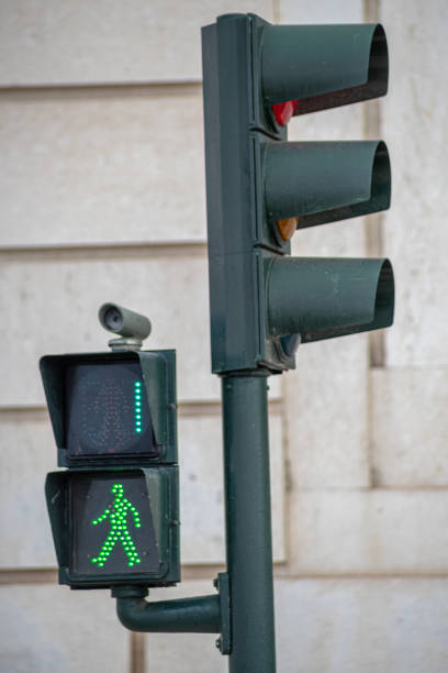 istock green traffic light for pedestrians counting down in 1 second in Lisbon. 1400639213