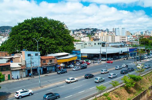 Residential panorama with buildings, trees, blue sky, traffic, clouds in the city of Belo Horizonte.