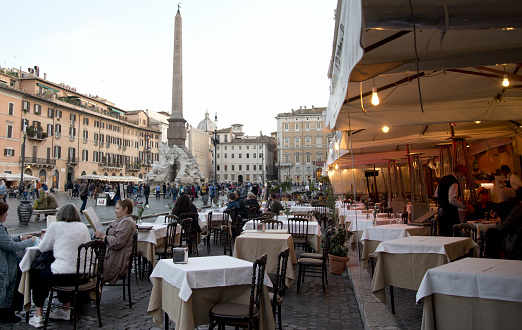 Rome, Italy. 10/28/2021: tourists at restaurant, Navona square, Rome, Italy.