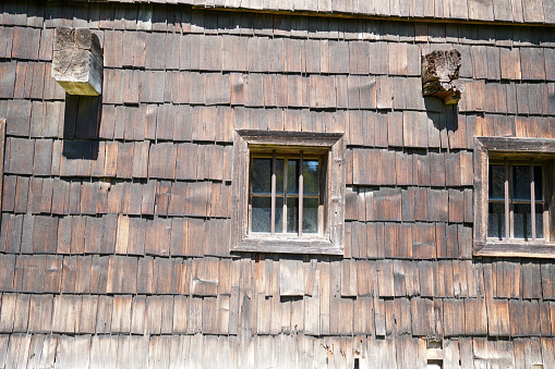 A Window and Wood roof tiles of and old house Wood texture background in Austria