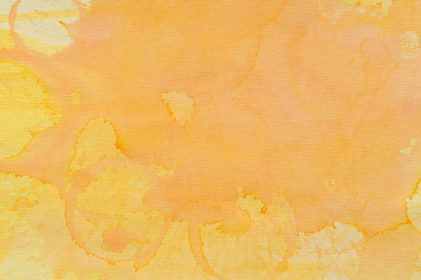 istock yellow painted watercolor background texture 1400639919