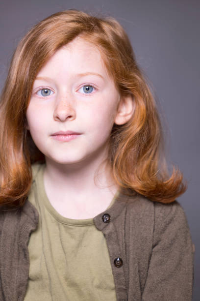 istock Auburn-haired girl of seven 1400641087
