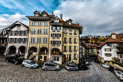 Houses, Apartment Buildings And Parked Vehicles On Streets Of Bern, Switzerland