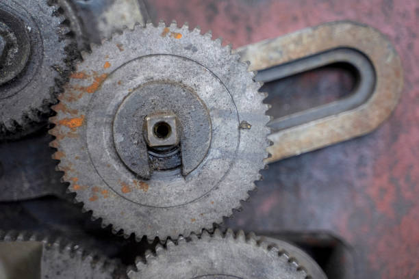 Gear machine at factory. Special tools for working. Blue collar worker concept.