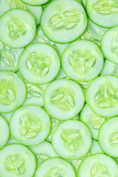 istock Macro Cucumber,Fresh slice cucumber on white background,Cucumber slice 1400644323