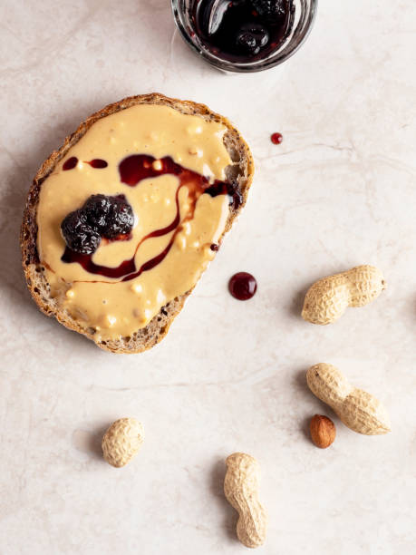istock Toasted bread with peanut butter, Peanut Butter and jam sandwich, Peanut Butter 1400644480