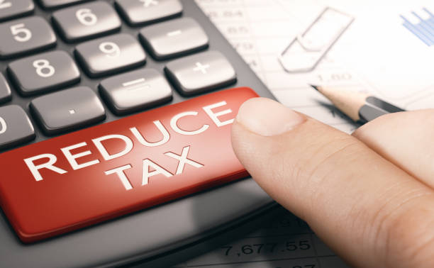 Reduce tax. Lowering taxable income. stock photo