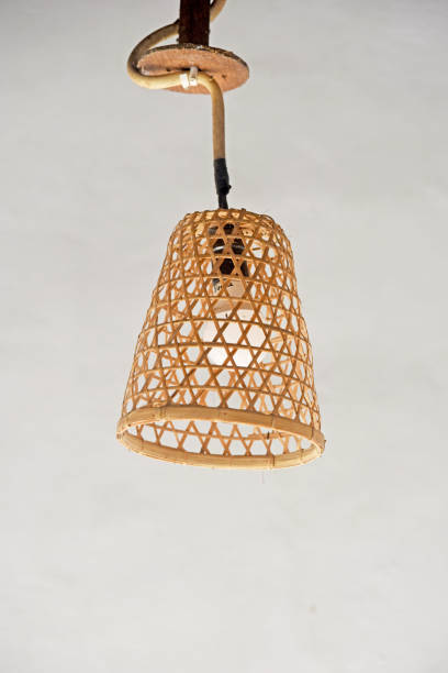 istock Electric lamp with bamboo decoration,on white wall 1400648294