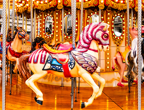 Stunning flying horse with traditional paintwork in a glittered vintage carousel